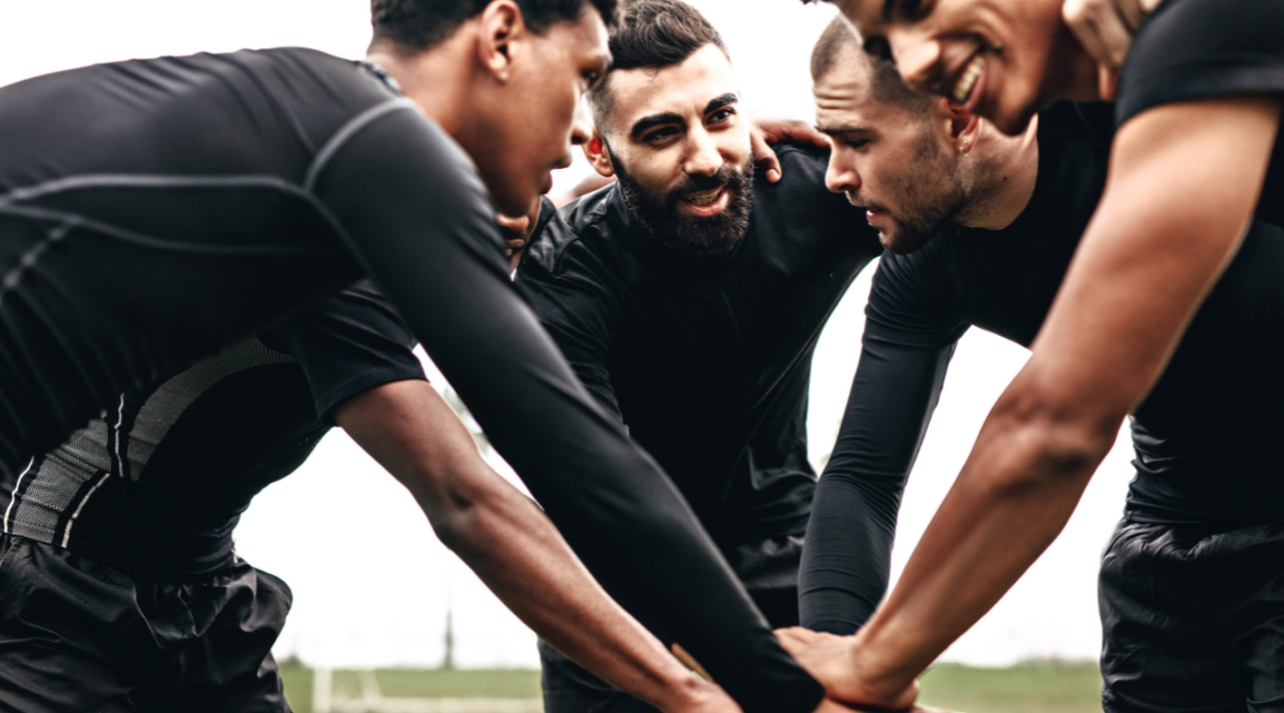 Sports Team_Men in a huddle_Physical IQ online Courses