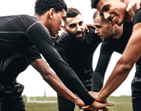 Sports Team_Men in a huddle_Physical IQ online Courses