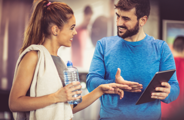 Man and woman Talking_Physical IQ online Fitness Courses